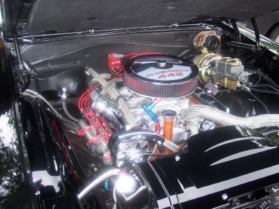 1972 Ford Ranchero - Close-up of a polished engine bay an Oldsmobile 442 air cleaner and chrome components.