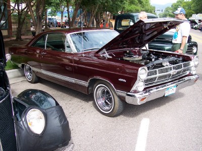 1972 Ford Ranchero - A maroon 1966 coupe is displayed with its hood open, revealing the engine compartment.