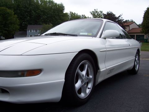 1993 Ford Probe - White 1993 Ford Probe GT shown from the front quarter angle.