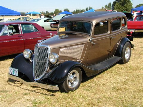 1967 Ford Ranchero - This 1934 Ford Sedan is a classic car with custom modifications, seen at a show.