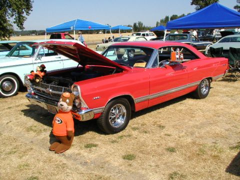 1967 Ford Ranchero - 1967 Ford Ranchero on display at a car show, an A&W mascot and other vehicles in the background.