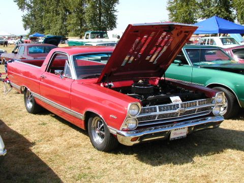 1967 Ford Ranchero - 1967 Ford Ranchero on display at a car show, hood raised to show the engine bay.