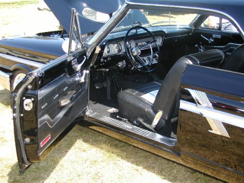 1967 Ford Ranchero - Interior view of a 1967 Ford Ranchero, showing the dashboard and seats.