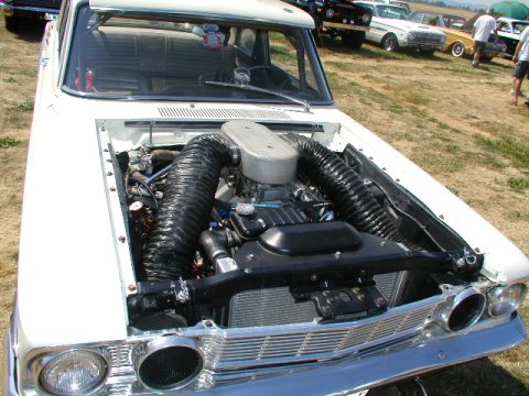 1967 Ford Ranchero - Customized 1967 Ford Ranchero shows off its powerful V8 engine and custom air intake system.