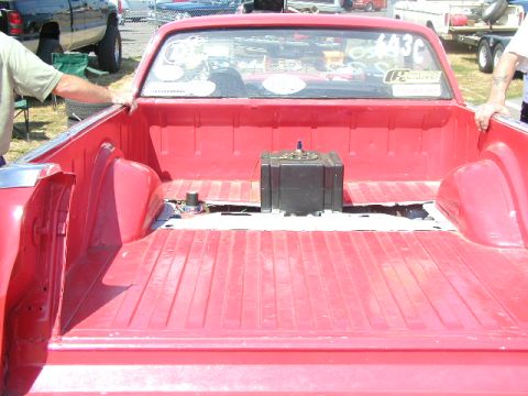 1967 Ford Ranchero - Rear view of a red 1967 Ford Ranchero pickup bed, modified with a fuel cell.