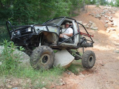 1974 Ford Bronco - high centered on rock