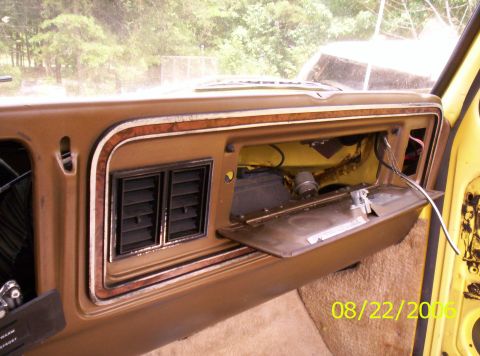 1978 Ford F-150 - Interior view of a 1978 Ford F-150, with the glove box open and air vents visible.
