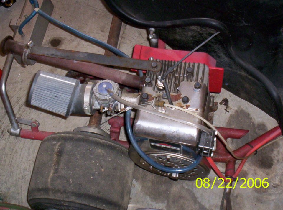 Go-kart engine with air filter and exhaust pipe