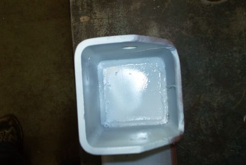 1983 Ford Bronco - This is a metal bracket, likely a vehicle part, shown from a top-down perspective.