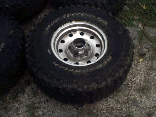 BFGoodrich Mud Terrain T/A tire on a silver 5-lug wheel, outdoors