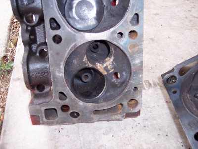 1972 Ford Ranchero - This engine part shows wear and tear with carbon deposits inside the cylinder head's combustion chambers.