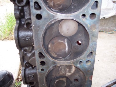 1972 Ford Ranchero - Close-up of an engine cylinder head, revealing internal components and signs of use.