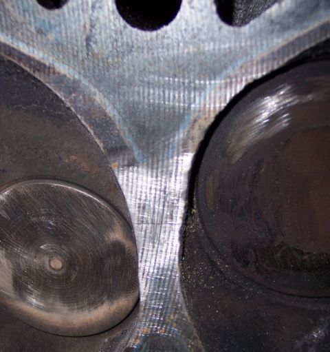 1972 Ford Ranchero - Engine cylinder head detail with intake and exhaust valves visible.