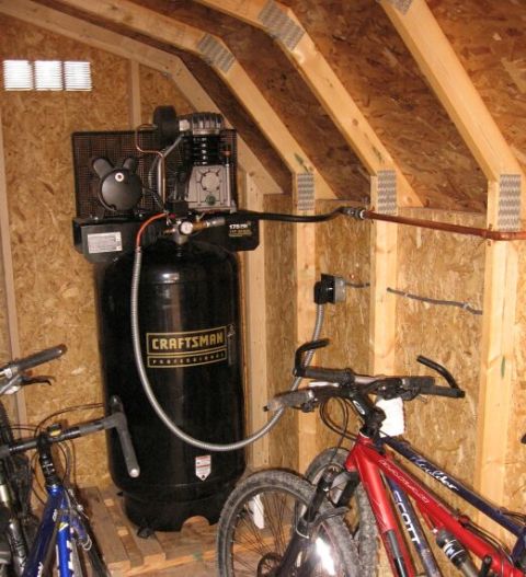 1986 Ford Ranger - A Craftsman air compressor is stored in a shed with bicycles parked nearby.