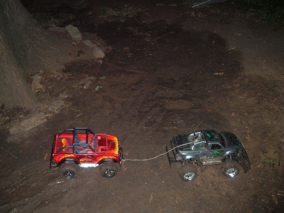 Pulling my bud's low battery bronco out of the mud