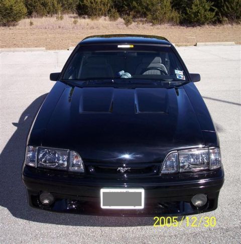 1969 Ford Mustang - This black Ford Mustang is shown from the front, a distinctive grille and hood design.