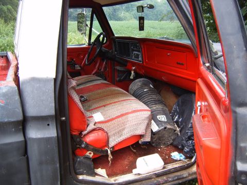 1993 Ford Bronco - Interior view of a vintage pickup truck, showing the driver's side seat and dashboard area.