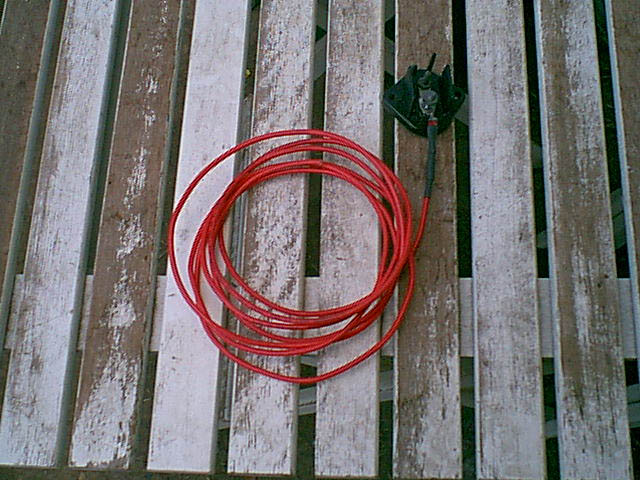 i trimed the 2 16 guage wires and soldered in a new 10 guage wire that will goto the battery. all other aux power will be pulled from here.