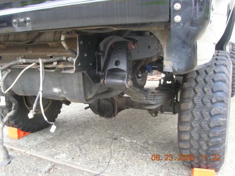 1996 Ford Bronco - Shackle flip. Stock mount, Belltech "lowering shackle" braced, and lowered mount.