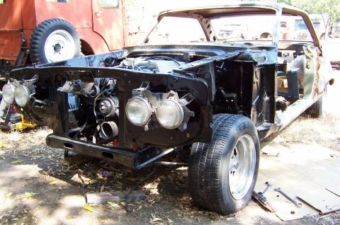 1964 Mercury Comet - This 1964 Mercury Comet is in a state of disassembly, showing its front end and engine bay.