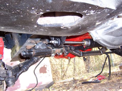1964 Mercury Comet - Close-up of a vehicle's steering and suspension system, showing various mechanical parts.