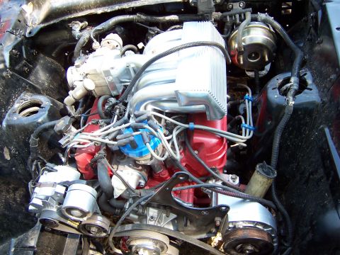 1964 Mercury Comet - Close-up view of a V8 engine bay, showing various components and wiring.