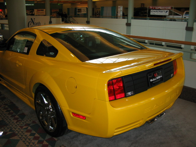 Yellow Saleen Mustang rear view, showing Saleen badging on the trunk lid and bumper