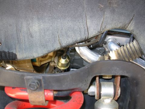 1994 Ford Bronco - The large gold object is the oil pressure sender, which is installed in a 45-degree union on a 4" long 1/4" galvanized pipe nipple that's s…
