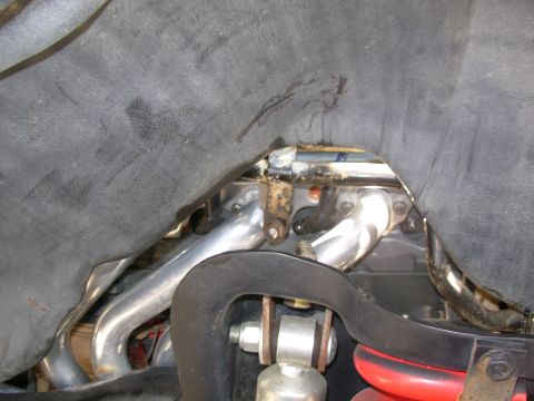 1994 Ford Bronco - The factory ex.man. bolts with studded heads don't fit with the header tubes, but one short bolt & nut were used to hold the secondary air…