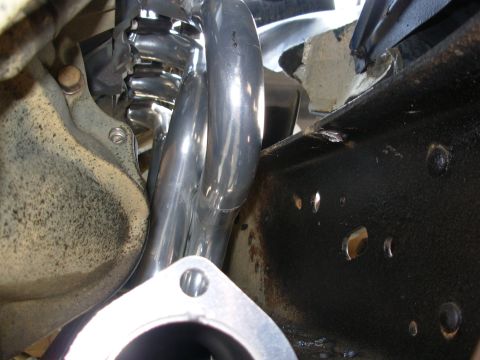 1994 Ford Bronco - The instructions say to remove the starter, position the header, then install the starter, then bolt the header to the head. But with the b…