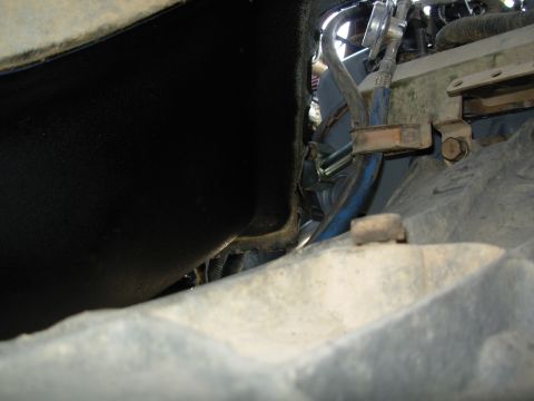 1994 Ford Bronco - Because of the body lift, the block at the L end of the crossover tube on the back of the heads comes VERY close to the body. When the engi…