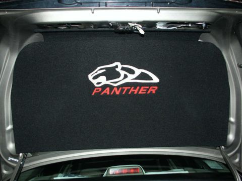 2001 Mercury Grand Marquis - The trunk liner displays a panther graphic and the word "PANTHER" in red lettering.