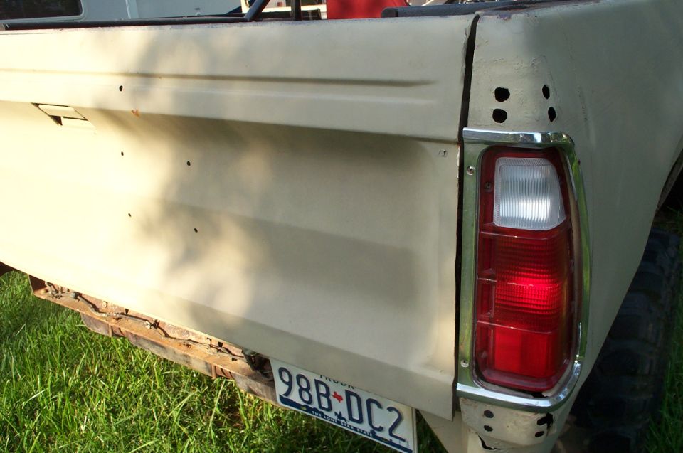 1978 Dodge Power Ram tailgate with license plate 98B-DC2 and red taillight