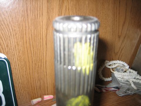 1986 Ford F-150 - Close-up of a splined shaft, possibly a vehicle part, with yellow markings.