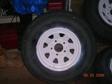 1996 Ford Bronco - A white painted rim and black tire are shown, with a date stamp visible in the lower right corner.