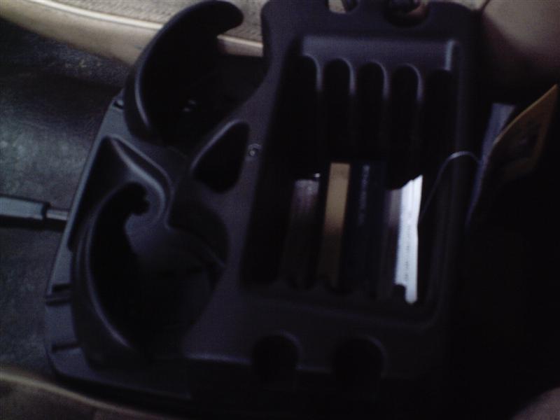Currently my "mini console" is wedged between the seats and sitting on top of the ebrake handle. This is obviously not ideal, but it has served me well for several months.