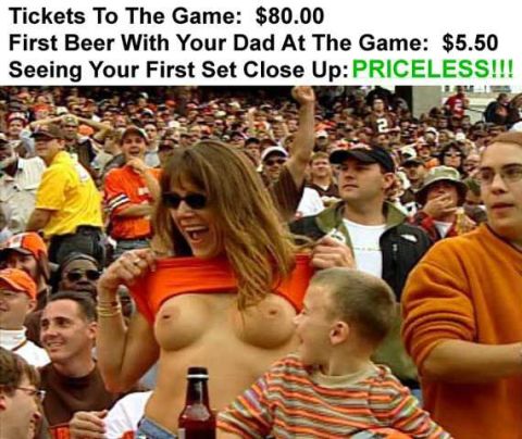1986 Ford Bronco - A woman flashes the crowd at a sporting event, with text above listing prices for game tickets and beer.