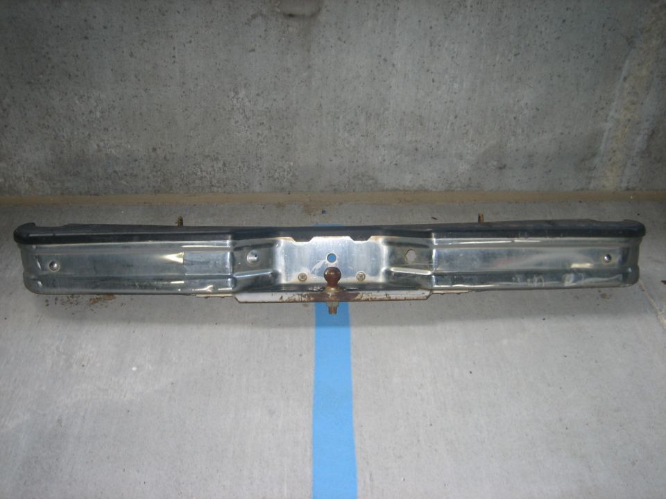 Chrome rear bumper with black rubber strip and tow ball mount