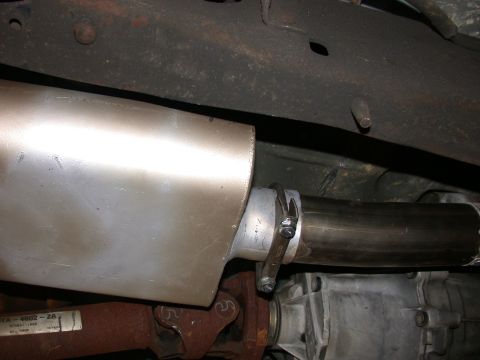 1995 Ford Bronco - Underside view of the exhaust system and transmission of a 1995 Ford Bronco.