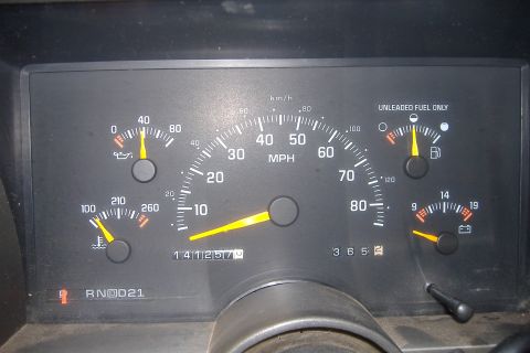 1994 Chevrolet Blazer - Dashboard gauges including speedometer, fuel, oil, and temperature, with odometer reading 141257.