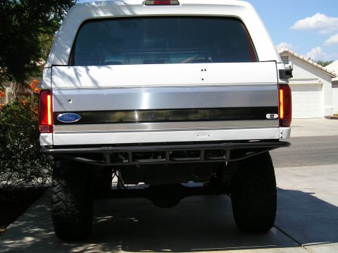 1993 Ford Bronco - Rear view of a 1993 Ford Bronco showing its custom bumper and tailgate.