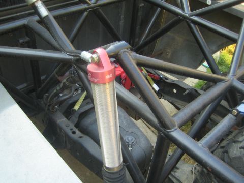 1968 Ford Mustang - Custom suspension components and roll cage structure are visible in this close-up shot.