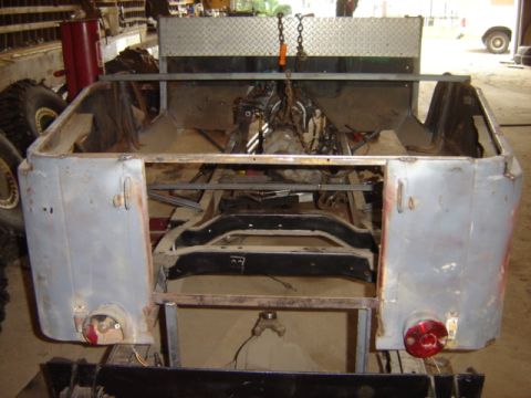 1992 Ford Bronco - This vehicle appears to be undergoing restoration or modification, with its chassis and bodywork exposed.