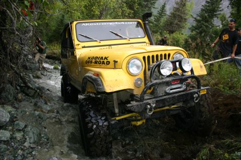 2003 Jeep TJ - Dan attached a strap to the frame rail and a couple guys rolled it back over