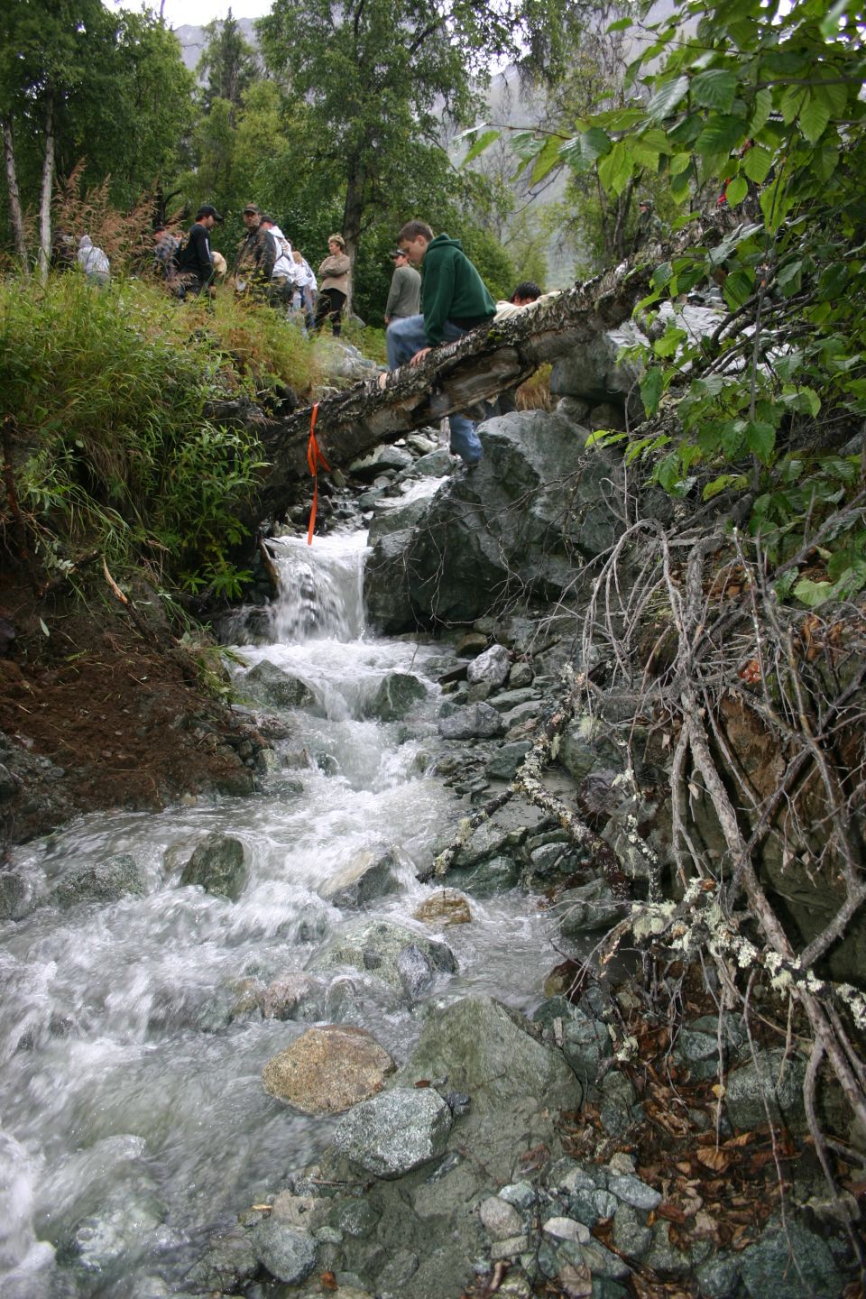 Why the course couldn't continue up the stream bed.