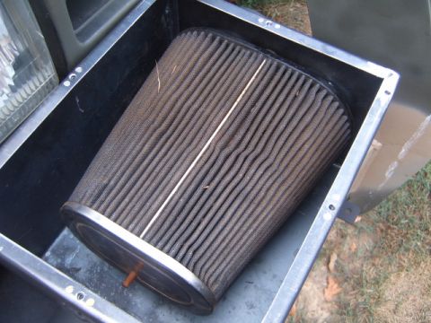 1988 Ford Bronco - Air filter element and housing shown, not a complete vehicle.