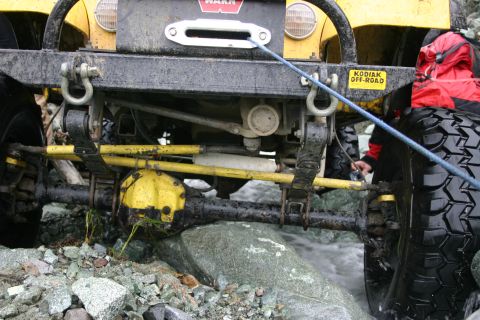 2003 Jeep TJ - Front axle stuck on a rock also