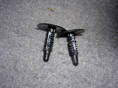 2000 Ford Crown Victoria - Pulled (3) of these plastic pins from the panel beneath the glovebox.