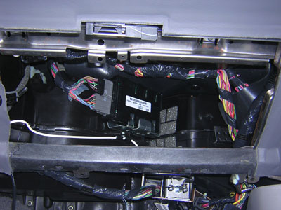 2000 Ford Crown Victoria - I tried and tried to find a good mounting spot for the Sirius Tuner behind the glovebox here but to no avail. I decided to mount it directl…