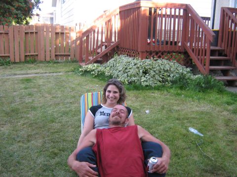1995 Ford Bronco - Couple relaxing in a backyard on a sunny day.